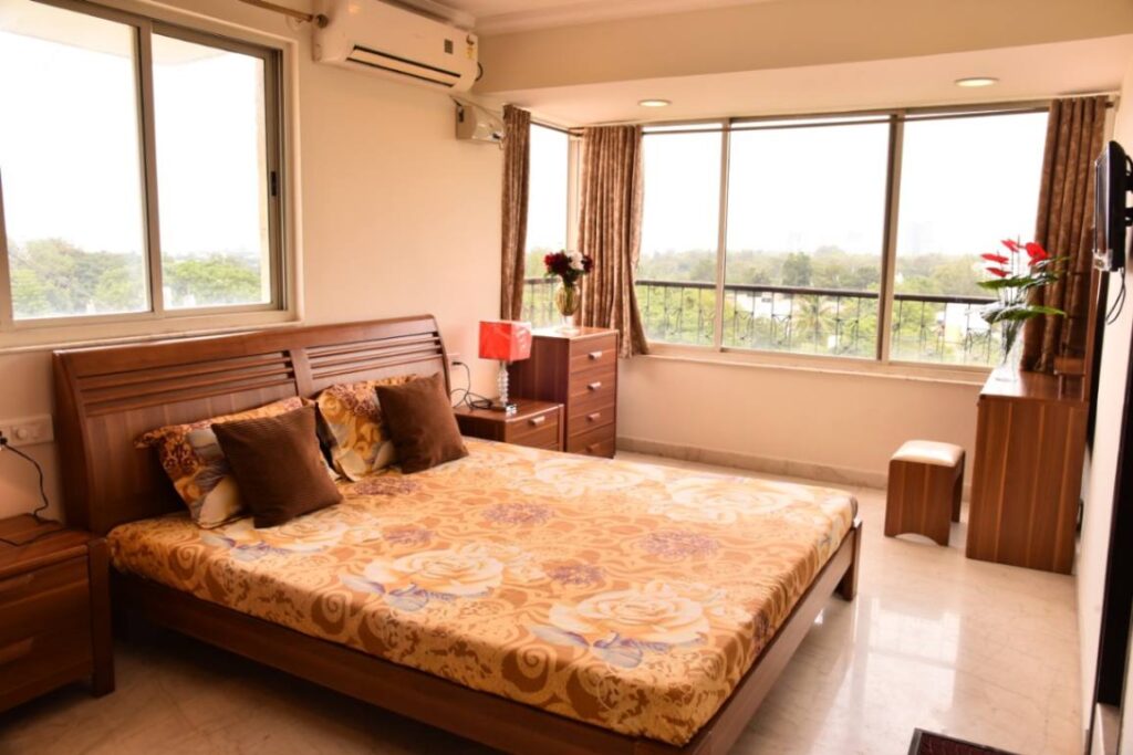 Varsha Apartments - Bedroom